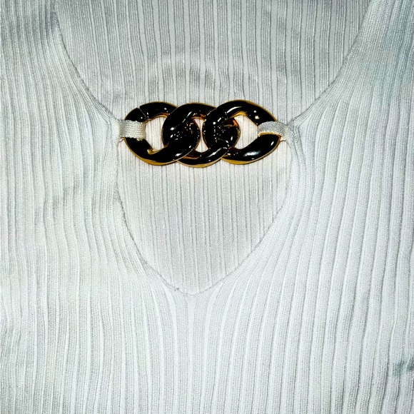White sweater, with gold chain accessory, has lots of stretch - Picture 2 of 2